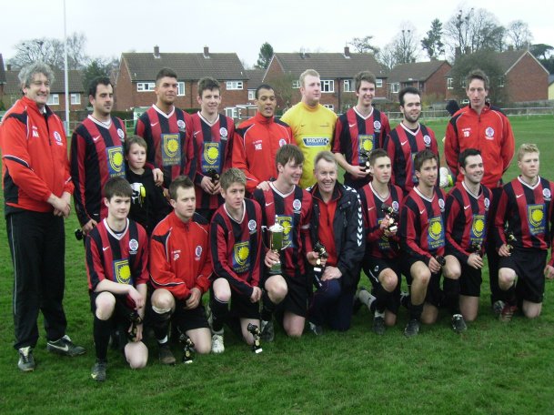 The squad celebrates the Radnorshire Cup win following the 1-0 victory over Talgarth Town